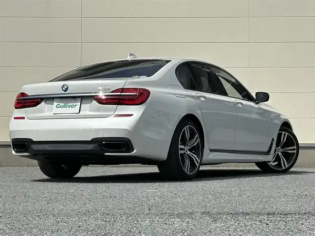 ＢＭＷ ７４０ｉ Mスポーツ 茨城県 2016(平28)年 5.5万km ミネラルホワイト 純正メーカオプションナビ/　(フルセグ/CD/DVD/Bluetooth)/全方位カメラ/黒革シート/サンルーフ/ETC/ドライビングアシスト/ハーマンカードン/クルーズコントロール/パドルシフト/パワーバックドア/プッシュスタート/USB入力端子/シートヒーター/パワーシート/LEDヘッドライト/純正アルミホイール