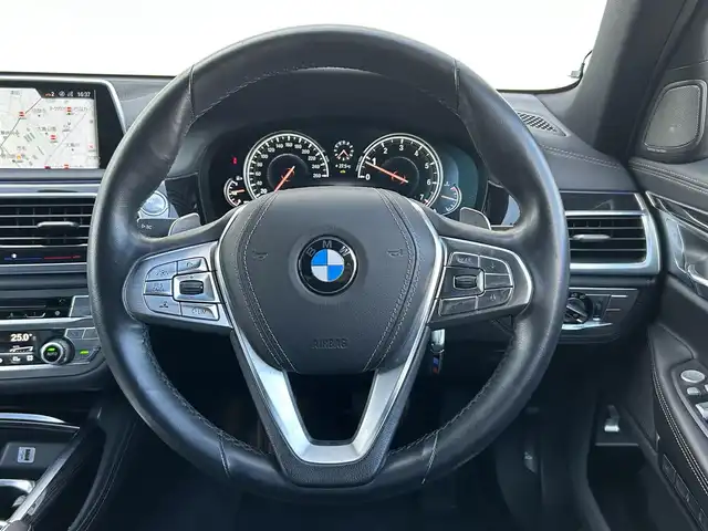 ＢＭＷ ７４０ｉ Mスポーツ 茨城県 2016(平28)年 5.5万km ミネラルホワイト 純正メーカオプションナビ/　(フルセグ/CD/DVD/Bluetooth)/全方位カメラ/黒革シート/サンルーフ/ETC/ドライビングアシスト/ハーマンカードン/クルーズコントロール/パドルシフト/パワーバックドア/プッシュスタート/USB入力端子/シートヒーター/パワーシート/LEDヘッドライト/純正アルミホイール