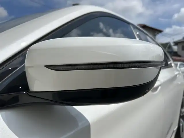 ＢＭＷ ７４０ｉ Mスポーツ 茨城県 2016(平28)年 5.5万km ミネラルホワイト 純正メーカオプションナビ/　(フルセグ/CD/DVD/Bluetooth)/全方位カメラ/黒革シート/サンルーフ/ETC/ドライビングアシスト/ハーマンカードン/クルーズコントロール/パドルシフト/パワーバックドア/プッシュスタート/USB入力端子/シートヒーター/パワーシート/LEDヘッドライト/純正アルミホイール