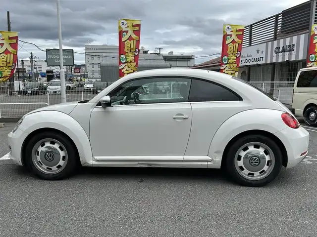 フォルクスワーゲン ザ・ビートル ミルク 奈良県 2014(平26)年 15.4万km キャンディホワイト ナビ/ターボ付/フルセグTV/ETC/Bluetooth/オートライト/フロアマット/コーナーセンサ/エアバック/スマートキー/保証書/取扱説明書