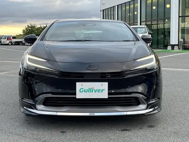 トヨタ プリウス Z 奈良県 2023(令5)年 1.2万km アティチュードブラックマイカ 純正１２．３インチディスプレイオーディオ/（フルセグ/BT/AppleCarPlay/AndroidAuto)/モデリスタフルエアロ/レーダークルーズコントロール/アラウンドビューモニター/ブラインドスポットモニター/プリクラッシュセーフティ/インテリジェントパーキングアシスト/レーンキープアシスト/電動リアゲート/ブラックレザーシート/運転席メモリ付きパワーシート/パワーイージーアクセスシステム/前席シートヒーター/前席エアーシート/ステアイングヒーター/ワイヤレス充電/デジタルインナーミラー/ETC2.0/純正19インチAW/スペアキーX1