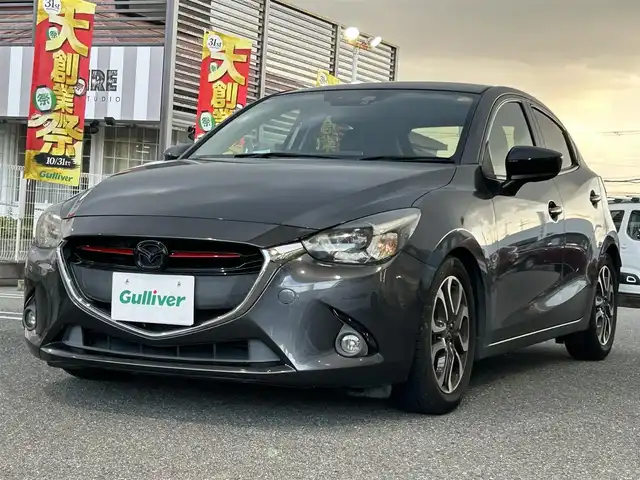 マツダ デミオ XD ツーリング 奈良県 2014(平26)年 9.6万km メテオグレーマイカ 4WD/純正メーカーナビ/BT/CD/USB/SD/TV/DVD//社外マフラー(RIVID)/社外エアクリ/RSR車高調/レーダー探知機/レーダークルコン/横滑り防止装置/i-stop/ステアリングスイッチ/パドルシフト/ターボ有/オートLEDライト