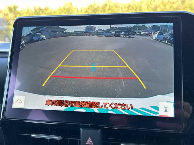 トヨタ ヴォクシー ハイブリッド S－Z 鹿児島県 2023(令5)年 1.7万km ホワイトパールクリスタルシャイン ワンオーナー/トヨタセーフティセンス/純正14インチフリップダウンモニター/純正ディスプレイオーディオ/（フルセグTV/Bluetooth/Miracast/CD/DVD/USB）/バックカメラ/両側パワースライドドア/助手席側ユニバーサルステップ/モデリスタシグネチャーイルミグリル/レーダークルーズコントロール/レーンディパーチャーアラート/プリクラッシュセーフティー/LEDヘッドライト/ハーフレザーシート/純正17インチアルミホイール/ステアリングヒーター/スマートキー/ETC2.0