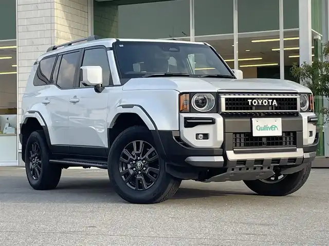 トヨタ ランドクルーザー ２５０ VX 兵庫県 2024(令6)年 0.8万km プラチナホワイトパールマイカ メーカーOPトヨタチームメイト/12.3インチディスプレイオーディオ/パノラミックビューモニター/黒レザー　ベンチレーションシート/モデリスタ/パワーバックドア/デジタルインナーミラー/サンルーフ/丸目LEDヘッドライト/社外フロアマット＋トランクマット/ワンオーナー/フルセグTV/パワーシート/シートヒーター/ルーフレール