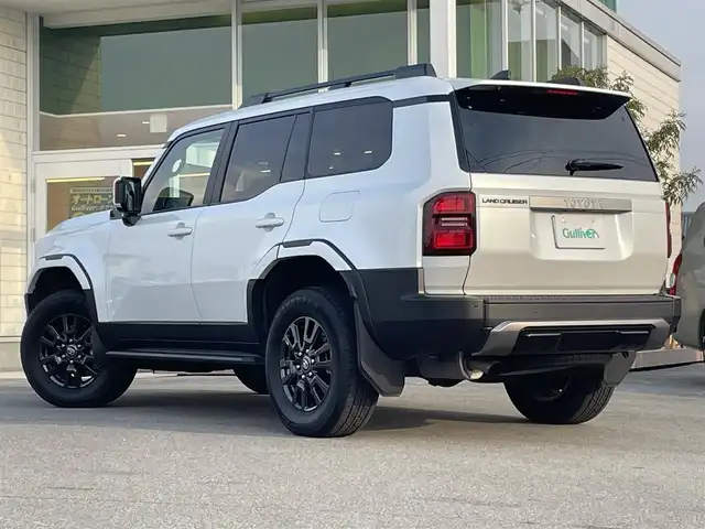 トヨタ ランドクルーザー ２５０ VX 兵庫県 2024(令6)年 0.8万km プラチナホワイトパールマイカ メーカーOPトヨタチームメイト/12.3インチディスプレイオーディオ/パノラミックビューモニター/黒レザー　ベンチレーションシート/モデリスタ/パワーバックドア/デジタルインナーミラー/サンルーフ/丸目LEDヘッドライト/社外フロアマット＋トランクマット/ワンオーナー/フルセグTV/パワーシート/シートヒーター/ルーフレール