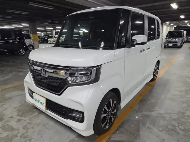 ホンダ Ｎ ＢＯＸ カスタム G L ホンダセンシング 長崎県 2020(令2)年 6.9万km プラチナホワイトパール 純正8型ナビ/フルセグTV/片側パワースライドドア/バックカメラ/ビルトインETC/アダプティブクルーズコントロール/ホンダセンシング/・衝突被害軽減ブレーキ/・車線逸脱防止支援システム/・前後誤発進抑制機能/・標識認識機能/・オートハイビーム/LEDヘッドランプ/ステアリングスイッチ/ベンチシート/前席シートヒーター/後席チップアップシート/純正14インチアルミホイール/スマートキー/プッシュエンジンスタート/禁煙車