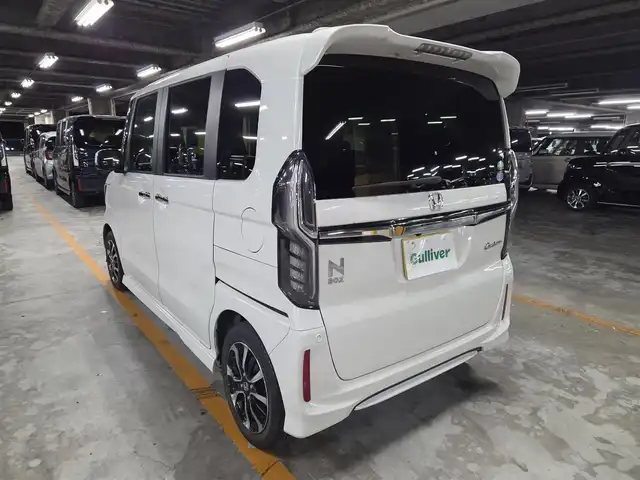 ホンダ Ｎ ＢＯＸ カスタム G L ホンダセンシング 長崎県 2020(令2)年 6.9万km プラチナホワイトパール 純正8型ナビ/フルセグTV/片側パワースライドドア/バックカメラ/ビルトインETC/アダプティブクルーズコントロール/ホンダセンシング/・衝突被害軽減ブレーキ/・車線逸脱防止支援システム/・前後誤発進抑制機能/・標識認識機能/・オートハイビーム/LEDヘッドランプ/ステアリングスイッチ/ベンチシート/前席シートヒーター/後席チップアップシート/純正14インチアルミホイール/スマートキー/プッシュエンジンスタート/禁煙車