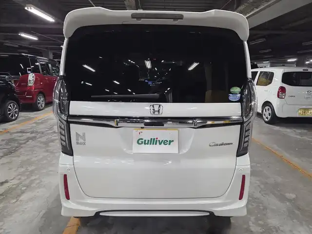 ホンダ Ｎ ＢＯＸ カスタム G L ホンダセンシング 長崎県 2020(令2)年 6.9万km プラチナホワイトパール 純正8型ナビ/フルセグTV/片側パワースライドドア/バックカメラ/ビルトインETC/アダプティブクルーズコントロール/ホンダセンシング/・衝突被害軽減ブレーキ/・車線逸脱防止支援システム/・前後誤発進抑制機能/・標識認識機能/・オートハイビーム/LEDヘッドランプ/ステアリングスイッチ/ベンチシート/前席シートヒーター/後席チップアップシート/純正14インチアルミホイール/スマートキー/プッシュエンジンスタート/禁煙車