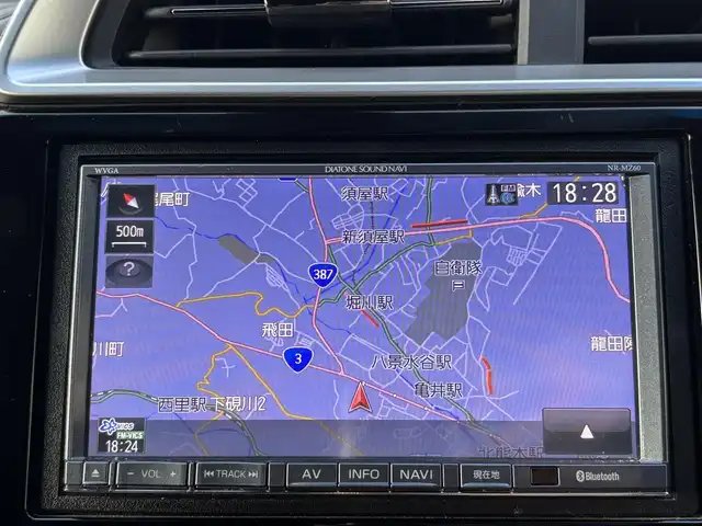 ホンダ フィット ハイブリット Sパッケージ 熊本県 2016(平28)年 6.7万km ティンテッドシルバーM 社外SDナビ(NR-MZ60)/【フルセグTV/SD/CD/DVD/Bluetooth】/バックカメラ/クルーズコントロール/車両接近通報装置/純正16インチアルミホイール/パドルシフト/オートLEDライト/ビルトインETC/横滑り防止装置/盗難防止装置/純正フロアマット/カーテンエアバッグ/プッシュスタート/スマートキー/スペアキー/取扱説明書/保証書