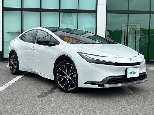 トヨタ プリウス Z 和歌山県 2023(令5)年 4.3万km プラチナホワイトパールマイカ 純正12.3インチナビ/フルセグTV/Bluetooth/AM/FM/パノラミックビュービューモニター/ETC2.0/トヨタセーフティセンス/PCS（プリクラッシュセーフティ）/BSM（ブラインドスポットモニター）/PDA（プロアクティブドライビングアシスト）/RCTA（リヤクロストラフィックアラート）/LTA（レーントレーシングアシスト）/LDA（レーンディパーチャーアラート）/クリアランスソナー/発進遅れ告知機能/緊急時操舵支援/トヨタチームメイト/アドバンストパーク/パノラマルーフ/パワーバックドア/デジタルインナーミラー/前後ドライブレコーダー/レザーシート/運転席パワーシート/前席シートヒーター/前席シートベンチレーション/革巻きステアリング/ステアリングヒーター/ステアリングスイッチ/LEDヘッドライト/オートライト/アダプティブハイビーム/電動パーキングブレーキ/オートブレーキホールド/純正19インチAW/プッシュスタート/スマートキー