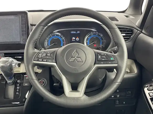 三菱 デリカミニ T プレミアム 新潟県 2025(令7)年 0.1千km アメジストブラック 4WD/プロパイロット/純正ディスプレイオーディオ/　AppleCarPlay/AndroidAuto/Bluetooth/HDMI/全方位モニター/両側パワースライドドア/衝突被害軽減ブレーキ/レーンキープアシスト/前後コーナーセンサー/レーダークルーズコントロール/ハーフレザーシート/前席シートヒーター/LEDヘッドライト/オートライト/ステアリングヒーター/パドルシフト/禁煙車