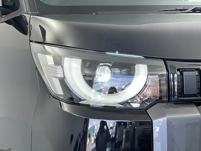 三菱 デリカミニ T プレミアム 新潟県 2025(令7)年 0.1千km アメジストブラック 4WD/プロパイロット/純正ディスプレイオーディオ/　AppleCarPlay/AndroidAuto/Bluetooth/HDMI/全方位モニター/両側パワースライドドア/衝突被害軽減ブレーキ/レーンキープアシスト/前後コーナーセンサー/レーダークルーズコントロール/ハーフレザーシート/前席シートヒーター/LEDヘッドライト/オートライト/ステアリングヒーター/パドルシフト/禁煙車