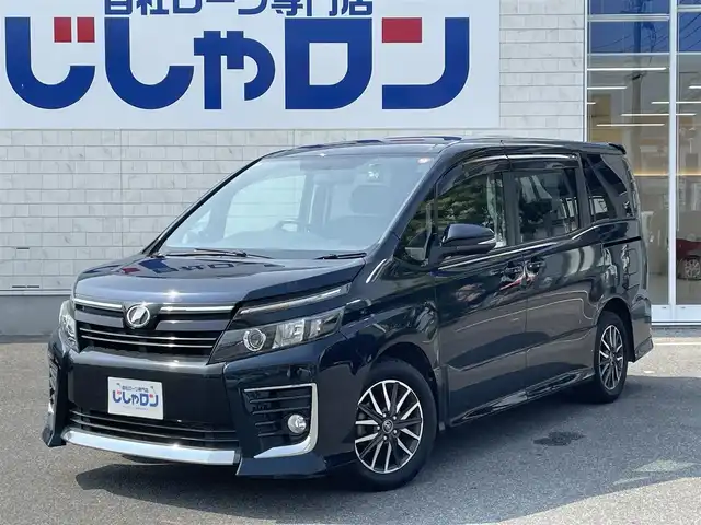 トヨタ ヴォクシー ZS 佐賀県 2014(平26)年 14.7万km ブラッキッシュアゲハガラスフレーク こちらは現金またはオートローンご利用時の価格です。/自社ローンご希望の方は別途その旨お申付け下さい/・外色:ブラキッシュアゲハガラスフレーク/・７人乗り/・両側電動スライド　/・純正ＳＤナビ/ＢＴオーディオ/フルセグ/ＤＶＤ/ＣＤ　/・社外ドラレコ　/・ＧＰＳレーダー　/・バックカメラ　/・ビルトインＥＴＣ