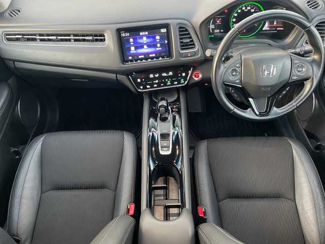 ホンダ ヴェゼル ハイブリッド Z ホンダセンシング 神奈川県 2018(平30)年 2.5万km ミッドナイトブルービームM 純正ナビ(VXM-187VFEi)/ワンセグ/Bluetooth/CD/DVD/HDMI/追従クルーズコントロール　/バックカメラ　/シートヒーター　/コーナーセンサー　/ビルドインＥＴＣ　/ドライブレコーダー　/LEDヘッドライト　/オートライト　/フォグライト　/ドアバイザー/純正フロアマット/純正アルミホイール/レーンキープアシスト/ABS/横滑り防止装置/衝突被害軽減システム/保証書/取扱説明書/記録簿