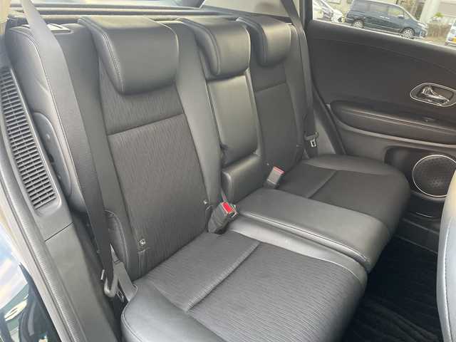 ホンダ ヴェゼル ハイブリッド Z ホンダセンシング 神奈川県 2018(平30)年 2.5万km ミッドナイトブルービームM 純正ナビ(VXM-187VFEi)/ワンセグ/Bluetooth/CD/DVD/HDMI/追従クルーズコントロール　/バックカメラ　/シートヒーター　/コーナーセンサー　/ビルドインＥＴＣ　/ドライブレコーダー　/LEDヘッドライト　/オートライト　/フォグライト　/ドアバイザー/純正フロアマット/純正アルミホイール/レーンキープアシスト/ABS/横滑り防止装置/衝突被害軽減システム/保証書/取扱説明書/記録簿