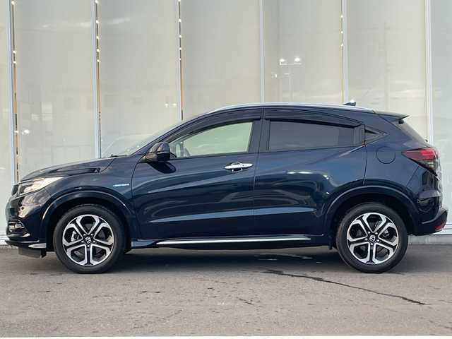 ホンダ ヴェゼル ハイブリッド Z ホンダセンシング 神奈川県 2018(平30)年 2.5万km ミッドナイトブルービームM 純正ナビ(VXM-187VFEi)/ワンセグ/Bluetooth/CD/DVD/HDMI/追従クルーズコントロール　/バックカメラ　/シートヒーター　/コーナーセンサー　/ビルドインＥＴＣ　/ドライブレコーダー　/LEDヘッドライト　/オートライト　/フォグライト　/ドアバイザー/純正フロアマット/純正アルミホイール/レーンキープアシスト/ABS/横滑り防止装置/衝突被害軽減システム/保証書/取扱説明書/記録簿