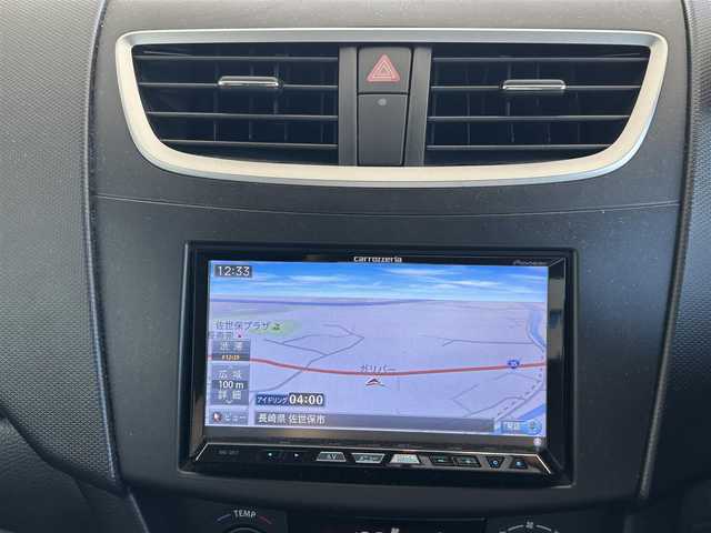 スズキ スイフト スポーツ 長崎県 2013(平25)年 5.1万km プレミアムシルバーメタリック 社外HDDナビ(FM/AM/BT/CD/DVD)/プッシュスタート/スマートキー/スペアキー(1本)/追従機能無しクルーズコントロール/ETC/バックカメラ/MTモード付AT/パドルシフト/ステアリングリモコン/前方ドラレコ/MonsterSport マフラー/ペダルカバー/フロアマット/純正17インチアルミホイール/ABS/ESP/オートライト/SRSダブルエアバッグ/フォグランプスイッチ/取扱説明書/保証書/記録簿/ナビ取扱説明書