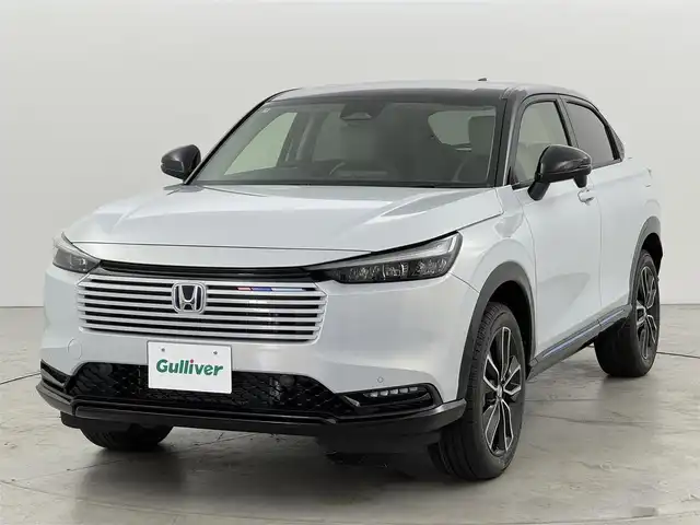ホンダ ヴェゼル ハイブリッド e:HEV Z PLaYパッケージ 福岡県 2025(令7)年 0.1千km パール 登録済未使用車/純正９型ナビ　/バックカメラ　/置くだけ充電　/ビルトインＥＴＣ２．０　/衝突軽減　/レーンキープ　/ＢＳＷ　/アクセル踏み間違い防止　/ヒルディセントコントロール　/パワーバックドア　/純正１８インチＡＷ　/ＬＥＤライト