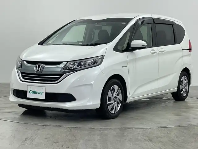 ホンダ フリード ハイブリット G ホンダセンシング 群馬県 2018(平30)年 6.3万km ホワイトオーキッドパール 純正９型ナビ　バックカメラ　衝突被害軽減ブレーキ　アダプティブクルーズコントロール　ビルトインＥＴＣ　ドライブレコーダー　レーンキープアシスト　ＬＥＤヘッドライト　スマートキー　オートライト