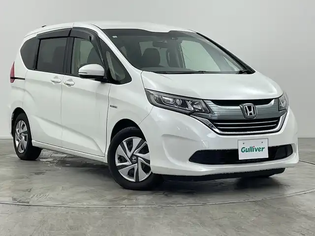 ホンダ フリード ハイブリット G ホンダセンシング 群馬県 2018(平30)年 6.3万km ホワイトオーキッドパール 純正９型ナビ　バックカメラ　衝突被害軽減ブレーキ　アダプティブクルーズコントロール　ビルトインＥＴＣ　ドライブレコーダー　レーンキープアシスト　ＬＥＤヘッドライト　スマートキー　オートライト