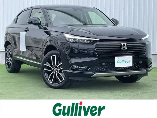 ホンダ ヴェゼル ハイブリッド e:HEV Z 香川県 2025(令7)年 0.1千km クリスタルブラックパール Honda SENSING/・衝突軽減ブレーキ/・誤発進抑制機能/・歩行者事故低減ステアリング/・路外逸脱抑制機能/・渋滞追従機能付きアダプティブクルーズコントロール/・車線維持支援システム /純正9インチナビ/(Bluetooth/FM/AM/Apple CarPlay/Android Auto/フルセグTV)/バックカメラ/ブラインドスポットモニター/ハンズフリー電動リアゲート/アダプティブドライビングビーム/LEDシーケンシャルターンシグナルランプ/前席シートヒーター/ビルトインETC2.0/純正18インチアルミホイール/コンビシート/パドルシフト/本革巻きステアリング/ステアリングリモコン/置くだけ充電/プッシュスタート/スマートキー/スペアキー