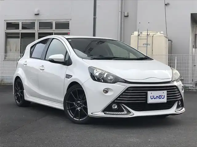 トヨタ アクア G G’s 栃木県 2015(平27)年 10.8万km ライムホワイトパールクリスタルシャイン (株)IDOMが運営する【じしゃロン小山店】の自社ローン対象車両になります。こちらは現金ご利用時の価格です。/自社ローンご希望の方は別途その旨お申付け下さい。//禁煙車/純正フルセグナビ/（CD/DVD/AM/FMラジオ）/(Bluetooth)/スマートキー/プッシュスタート/バックカメラ/ＥＴＣ/クルーズコントロール/ドライブレコーダー/シートヒーター/ステアリングリモコン/電動格納ドアミラー/パワーウインドウ/オートライト/防眩ミラー