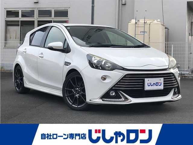 トヨタ アクア G G’s 千葉県 2015(平27)年 10.8万km ライムホワイトパールクリスタルシャイン (株)IDOMが運営する【じしゃロン柏店】の自社ローン対象車両になります。こちらは現金ご利用時の価格です。/自社ローンご希望の方は別途その旨お申付け下さい。//禁煙車/純正フルセグナビ/（CD/DVD/AM/FMラジオ）/(Bluetooth)/スマートキー/プッシュスタート/バックカメラ/ＥＴＣ/クルーズコントロール/ドライブレコーダー/シートヒーター/ステアリングリモコン/電動格納ドアミラー/パワーウインドウ/オートライト/防眩ミラー