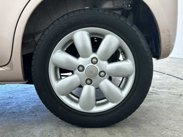 スズキ ラパン XL 三重県 2013(平25)年 4.9万km シャンパンピンクPM /禁煙車//社外SDナビ/（フルセグ/CD/DVD/AM/FM）//シートヒーター//ETC//純正14インチアルミホイール//アイドリングストップ//革巻きステアリング//プッシュスタート//スマートキー//ウィンカーミラー//電動格納ミラー//純正フロアマット