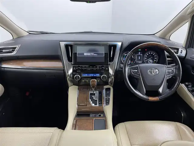 トヨタ アルファードハイブリット エグゼクティブ ラウンジ 千葉県 2016(平28)年 6.7万km ラグジュアリーホワイトパールクリスタルシャインガラスフレーク 禁煙車/４WD/トヨタセーフティセンス/・クリアランスソナー/・プリクラッシュセーフティブレーキ/・クルーズコントロール/JBLプレミアムサウンド/両側パワースライドドア/パワーバックドア/ツインサンルーフ/12.1型フリップダウンモニター/純正９型ディスプレイオーディオナビ/・CD/DVD/USB/AUX/HDMI/Bluetooth/フルセグTV/・バックカメラ/・ビルトインETC/革巻きステアリング/・ステアリングスイッチ/100V電源/レザーシート/・DNセカンドパワーシート/・D席メモリ付き/・DNシートヒーター/・オットマン/電子パーキング/・ブレーキホールド/社外フロアマット/純正１７インチAW/オートライト/・LEDヘッドライト/・LEDフォグランプ