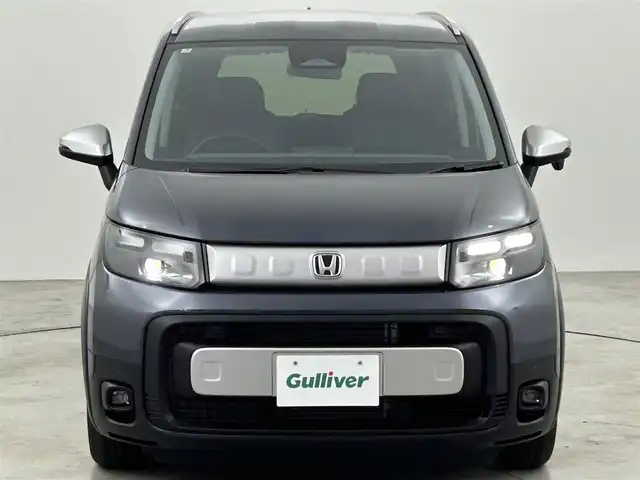 ホンダ フリード ハイブリット e:HEV クロスター 福岡県 2025(令7)年 0.1千km メテオロイドグレーメタリック 登録済未使用車　/純正ナビ（ＢＴ，フルセグＴＶ）　/バックカメラ　/ＡＣＣ　/コーナーセンサー　/衝突軽減ブレーキ　/レーンキープ　/ＢＳＭ　/先行車発進お知らせ　/両側電動スライドドア　/ハーフレザー　/シートヒーター