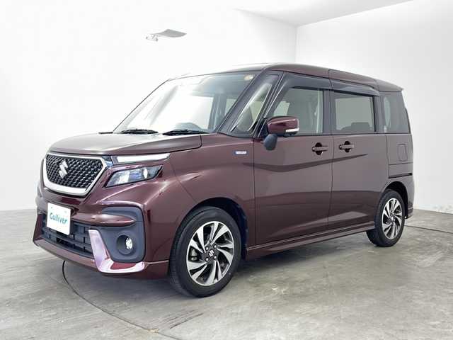 スズキ ソリオ バンディット HV MV 兵庫県 2023(令5)年 1.9万km メロウディープレッドパール ・純正ナビ&Bluetoothオーディオ&CD/DVD&ipod/USB接続&TV/・全方位カメラ/・ビルドインETC/・シートヒーター/・純正フロアマット/・両側パワースライドドア/・純正15インチアルミホイール/・スズキセーフティサポート/・衝突被害軽減ブレーキ/・レーダークルーズコントロール/・レーンキープアシスト/・ハイビームアシスト/・クリアランスソナー/・盗難防止装置/・アイドリングストップ/・オートライト/・LEDヘッドライト/・LEDフォグランプ/・カーテンエアバック/・ヘッドアップディスプレイ/・スマートキー/・スペアキー/・AACエアコン/・ステアリングスイッチ/・革巻きステアリング/・電動格納ミラー/・サンシェード