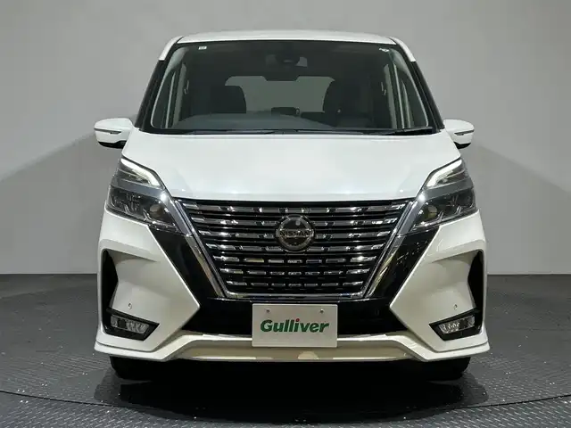 日産 セレナ ハイウェイスター V 愛媛県 2021(令3)年 2.2万km ブリリアントホワイトパール 純正10インチナビ/(Bluetooth/フルセグ)/プロパイロット/純正フリップダウンモニター/両側パワースライドドア/衝突被害軽減ブレーキ/コーナーセンサー/レーンキープアシスト/ブラインドスポットモニター/キャプテンシート/ETC/オートマチックハイビーム/オートライト/フォグランプ/アイドリングストップ/ドアバイザー/プッシュスタート/スペアキー/保証書/取扱説明書