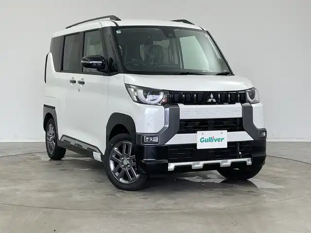 三菱 デリカミニ T プレミアム 新潟県 2025(令7)年 0.1千km アメジストブラック/シルキーホワイト 4WD/プロパイロット/純正ディスプレイオーディオ/　AppleCarPlay/AndroidAuto/Bluetooth/HDMI/全方位モニター/両側パワースライドドア/衝突被害軽減ブレーキ/レーンキープアシスト/前後コーナーセンサー/レーダークルーズコントロール/ハーフレザーシート/前席シートヒーター/オートマチックハイビーム/LEDヘッドライト/オートライト/ステアリングヒーター/パドルシフト/禁煙車