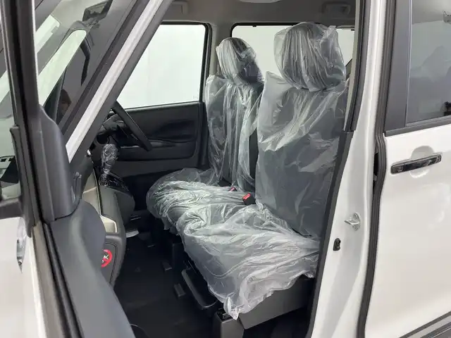 三菱 デリカミニ T プレミアム 新潟県 2025(令7)年 0.1千km アメジストブラック/シルキーホワイト 4WD/プロパイロット/純正ディスプレイオーディオ/　AppleCarPlay/AndroidAuto/Bluetooth/HDMI/全方位モニター/両側パワースライドドア/衝突被害軽減ブレーキ/レーンキープアシスト/前後コーナーセンサー/レーダークルーズコントロール/ハーフレザーシート/前席シートヒーター/オートマチックハイビーム/LEDヘッドライト/オートライト/ステアリングヒーター/パドルシフト/禁煙車