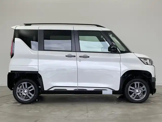 三菱 デリカミニ T プレミアム 新潟県 2025(令7)年 0.1千km アメジストブラック/シルキーホワイト 4WD/プロパイロット/純正ディスプレイオーディオ/　AppleCarPlay/AndroidAuto/Bluetooth/HDMI/全方位モニター/両側パワースライドドア/衝突被害軽減ブレーキ/レーンキープアシスト/前後コーナーセンサー/レーダークルーズコントロール/ハーフレザーシート/前席シートヒーター/オートマチックハイビーム/LEDヘッドライト/オートライト/ステアリングヒーター/パドルシフト/禁煙車
