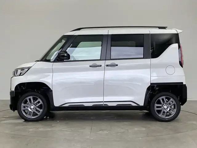 三菱 デリカミニ T プレミアム 新潟県 2025(令7)年 0.1千km アメジストブラック/シルキーホワイト 4WD/プロパイロット/純正ディスプレイオーディオ/　AppleCarPlay/AndroidAuto/Bluetooth/HDMI/全方位モニター/両側パワースライドドア/衝突被害軽減ブレーキ/レーンキープアシスト/前後コーナーセンサー/レーダークルーズコントロール/ハーフレザーシート/前席シートヒーター/オートマチックハイビーム/LEDヘッドライト/オートライト/ステアリングヒーター/パドルシフト/禁煙車