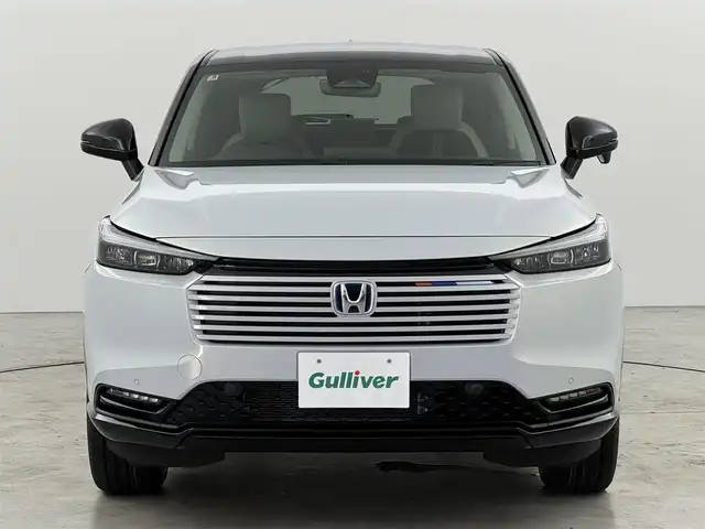 ホンダ ヴェゼル ハイブリッド e:HEV Z PLaYパッケージ 福岡県 2025(令7)年 0.1千km プレミアムサンライトホワイトパール 登録済未使用車　/純正９型ナビ　/バックカメラ　/置くだけ充電　/ＥＴＣ２．０　/衝突軽減　/レーンキープ　/ＢＳＷ　/アクセル踏み間違い防止　/パドルシフト　/ヒルディセントコントロール　/パワーバックドア　/純正１８インチＡＷ　/ＬＥＤ