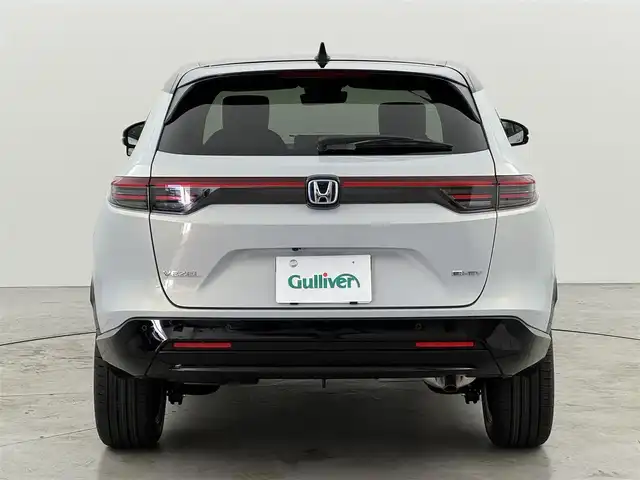 ホンダ ヴェゼル ハイブリッド e:HEV Z PLaYパッケージ 福岡県 2025(令7)年 0.1千km プレミアムサンライトホワイトパール 登録済未使用車　/純正９型ナビ　/バックカメラ　/置くだけ充電　/ＥＴＣ２．０　/衝突軽減　/レーンキープ　/ＢＳＷ　/アクセル踏み間違い防止　/パドルシフト　/ヒルディセントコントロール　/パワーバックドア　/純正１８インチＡＷ　/ＬＥＤ