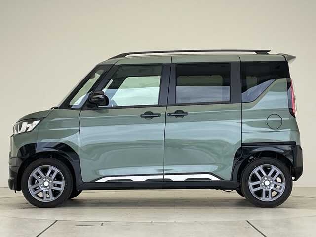 三菱 デリカミニ T プレミアム 愛知県 2025(令7)年 0.1千km 緑Ｍ 届出済未使用車/純正9型ディズプレイオーディオ　ナビ機能なし/マイパイロット/サイドデカール/全方位カメラ/両側パワースライドドア/シートヒーター/クルーズコントロール/コーナーセンサー/純正アルミホイール/ルーフレール/LEDヘッドライト/パドルシフト/インテリジェントミラー/オートマチックハイビーム/衝突軽減システム/Bluetooth/ステアリングスイッチ/スマートキー/プッシュスタート