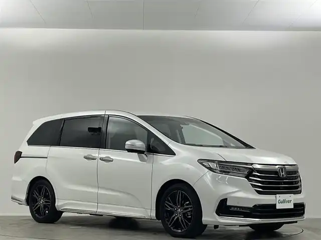 ホンダ オデッセイ ハイブリッド e:HEVアブソルート EX 埼玉県 2021(令3)年 2.8万km プラチナホワイトパール 純正１０インチナビ　１２．８型後席モニター　アラウンドビューモニター　温シート　ブラインドスポットモニター　液晶ミラー　ハーフレザーシート　両側電動　レーダークルーズコントロール　ドラレコ　ＥＴＣ