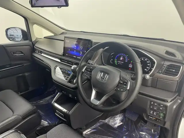 ホンダ オデッセイ ハイブリッド e:HEVアブソルート EX 埼玉県 2021(令3)年 2.8万km プラチナホワイトパール 純正１０インチナビ　１２．８型後席モニター　アラウンドビューモニター　温シート　ブラインドスポットモニター　液晶ミラー　ハーフレザーシート　両側電動　レーダークルーズコントロール　ドラレコ　ＥＴＣ