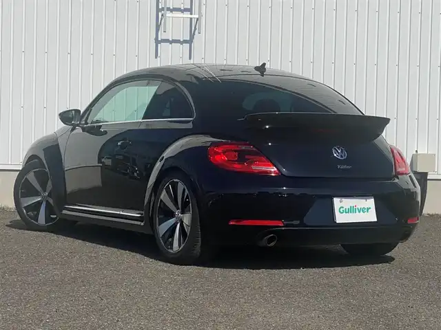 フォルクスワーゲン ザ・ビートル ターボ 熊本県 2014(平26)年 6万km 黒 純正ナビ/FM/AM/CD/DVD/SD/BT/VTR/MusicCatcher/・DTV/・バックカメラ/パッシブセーフティ/・フロントエアバック/・サイドエアバック/・むちうち軽減ヘッドレスト/クルーズコントロール/コーナーセンサー/サンルーフ/ドライブレコーダー（前方）/革巻きステアリング/ステアリングスイッチ/ウィンカーミラー/電動格納ミラー/ミラーヒーター/パーキングライト/オートライト/レーダー検知（社外）/社外車高調/純正フロアマット/純正ドアバイザー/純正アルミホイール