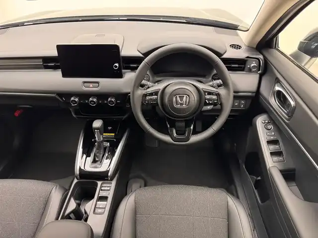 ホンダ ヴェゼル ハイブリッド e:HEV Z 兵庫県 2025(令7)年 0.1千km クリスタルブラックパール 登録済未使用車/純正メモリナビ/（BT、フルセグ、USB）/純正DA/（APPLECarPlay、AndroidAut）/ワイヤレス充電/バックカメラ/コーナーセンサー/パドルシフト/ステアリングヒーター/シートヒーター/ハーフレザー/ビルトインＥＴＣ２．０/ACC/PCS/BSM/LKA/オートハイビーム/LEDヘッドライト/LEDフォグランプ/パワーバックドア/スペアキー×１/純正18インチAW