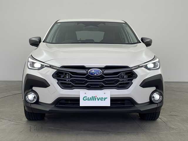 スバル クロストレック リミテッド 兵庫県 2023(令5)年 0.8万km クリスタルホワイトP ・純正11.6インチセンターディスプレイナビ/（TV/BT/USB/AUX)/・全方位カメラ/・ビルトインETC/・アイサイト/・プリクラッシュブレーキ/・エマージェンシーブレーキアシスト/・車線逸脱防止機能/・スバルリヤビークルディテクション(SRVD)/・ドライバーモニタリングシステム/・VDC/・オートビークルホールド(AVH)/・ステアリング連動ヘッドランプ（SRH）/・オートマチックハイビーム/・レーダークルーズコントロール/・SIーDRIVE/・パドルシフト/・運転席メモリー付きパワーシート/・前席シートヒーター/・ステアリングヒーター/・LEDフォグランプ/・リアフォグランプ/・スマートキー