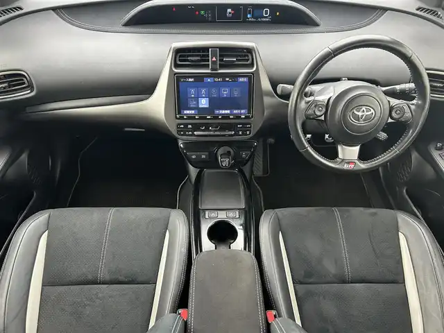 トヨタ プリウス ＰＨＶ S GRスポーツ 岡山県 2019(令1)年 11万km ホワイトパールクリスタルシャイン 登録時走行距離109597km/純正9インチナビ/フルセグTV(AM/FM/CD/DVD/Bluetooth)/バックカメラ/ビルトインETC2.0/ドライブレコーダー/トヨタセーフティセンス/・レーダークルーズコントロール/・プリクラッシュセーフティ/・オートマチックハイビーム/・レーントレーシングアシスト/横滑り防止装置/D/N席シートヒーター/純正フロアマット/18インチ純正AW/LEDヘッドライト/プッシュスタート/スマートキー/充電ケーブル