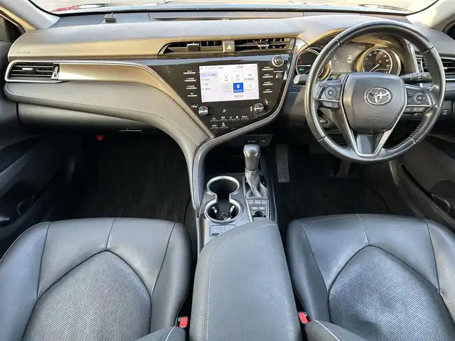 トヨタ カムリ WS ブラックエディション 岡山県 2021(令3)年 6.5万km プレシャスブラックパール 登録時走行距離65032km/純正ナビ/(AM.FM.BT)/バックカメラ/ETC2.0/ブラインドスポットモニター/シートヒーター/クリアランスソナー/衝突軽減ブレーキ/横滑り防止装置/クルーズコントロール(追従走行あり)/車線逸脱警報（レーンキープアシスト）/オートライト/オートマチックハイビーム/アイドリングストップ/電動リアゲート/18インチ純正AW/純正フロアマット/ハーフレザーシート/D+N席パワーシート