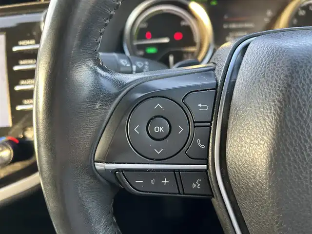 トヨタ カムリ WS ブラックエディション 岡山県 2021(令3)年 6.5万km プレシャスブラックパール 登録時走行距離65032km/純正ナビ/(AM.FM.BT)/バックカメラ/ETC2.0/ブラインドスポットモニター/シートヒーター/クリアランスソナー/衝突軽減ブレーキ/横滑り防止装置/クルーズコントロール(追従走行あり)/車線逸脱警報（レーンキープアシスト）/オートライト/オートマチックハイビーム/アイドリングストップ/電動リアゲート/18インチ純正AW/純正フロアマット/ハーフレザーシート/D+N席パワーシート