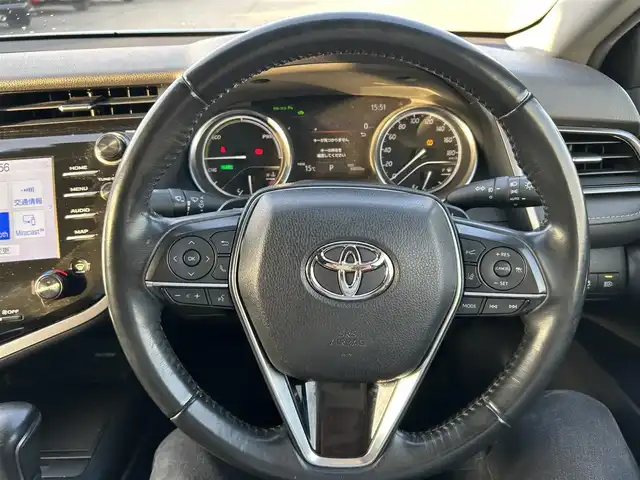 トヨタ カムリ WS ブラックエディション 岡山県 2021(令3)年 6.5万km プレシャスブラックパール 登録時走行距離65032km/純正ナビ/(AM.FM.BT)/バックカメラ/ETC2.0/ブラインドスポットモニター/シートヒーター/クリアランスソナー/衝突軽減ブレーキ/横滑り防止装置/クルーズコントロール(追従走行あり)/車線逸脱警報（レーンキープアシスト）/オートライト/オートマチックハイビーム/アイドリングストップ/電動リアゲート/18インチ純正AW/純正フロアマット/ハーフレザーシート/D+N席パワーシート