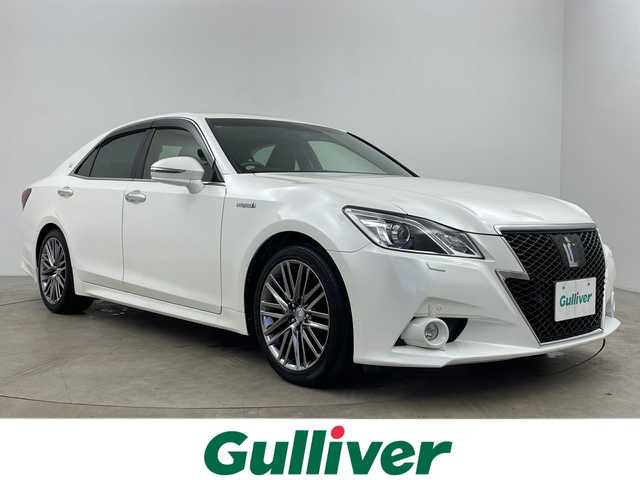 トヨタ クラウン ハイブリッド アスリートG 鹿児島県 2013(平25)年 5.5万km ホワイトパールクリスタルシャイン 純正ナビ/(フルセグTV/BT/CD/DVD/FM/AM)/バックカメラ/衝突被害軽減システム/車線逸脱警報/クルーズコントロール/サンルーフ/レザーシート/横滑り防止装置/ビルトインETC/ドライブレコーダー/アイドリングストップ/フォグランプ/オートライト/ウィンカーミラー/電動格納ミラー/純正18インチAW/シートヒーター/エアシート/シートリフター/ステアリングヒーター/メモリー機能付きパワーシート/プッシュスタート/スマートキー/フロアマット/ドアバイザー/スペアキー/取扱説明書/保証書