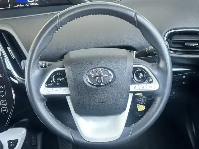 トヨタ プリウス ＰＨＶ S ナビパッケージ 愛知県 2017(平29)年 5万km スティールブロンドM TRDエアロ/プラグインハイブリッド/Sナビパッケージ/純正縦型ナビ/（CD/BT/フルセグ）/バックカメラ/ETC/前後ドラレコ/レーダークルーズコントロール/前席シートヒーター/AC100V/トヨタセーフティセンス/コーナーセンサー/純正AW/純正フロアマット